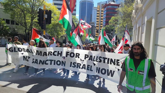 The "Global March for Palestine" banner in Auckland Tāmaki Makaurau