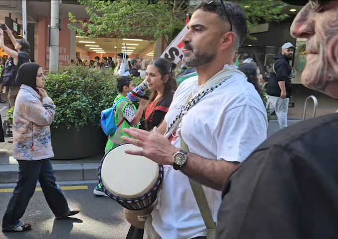 The author, Youssef Sammour, with drum during the Global March for Palestine