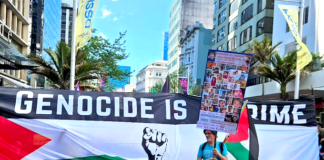 A protester ahead of the Global March for Palestine up Auckland's Queen Street