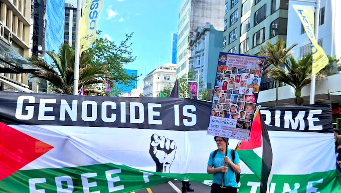 A protester ahead of the Global March for Palestine up Auckland's Queen Street