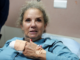 Badly beaten photographer Heidi Levine in hospital