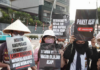 Environmental activists protesting in Jakarta against forest and land fires