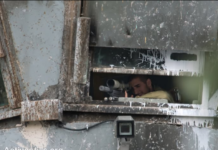 Israeli sniper position in a watchtower in the illegally occupied West Bank
