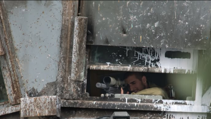 Israeli sniper position in a watchtower in the illegally occupied West Bank