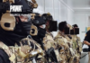 Masked Kumul 23 elite police tactical force members