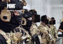 Masked Kumul 23 elite police tactical force members