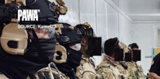 Masked Kumul 23 elite police tactical force members