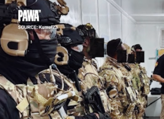 Masked Kumul 23 elite police tactical force members