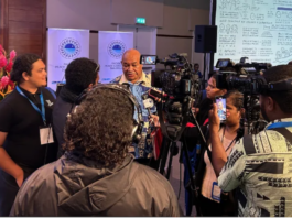 Local Fiji journalists conduct an interview at the Pacific Peace and Security Dialogue in Suva