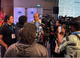 Local Fiji journalists conduct an interview at the Pacific Peace and Security Dialogue in Suva