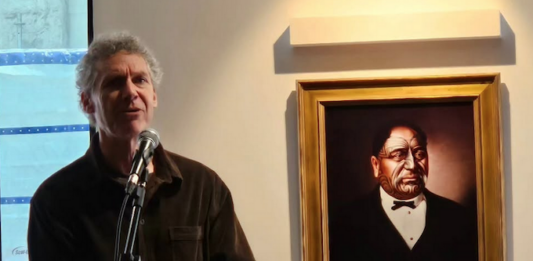 Writer Nick Bollinger speaking at the Roger Fowler whānau's book launch