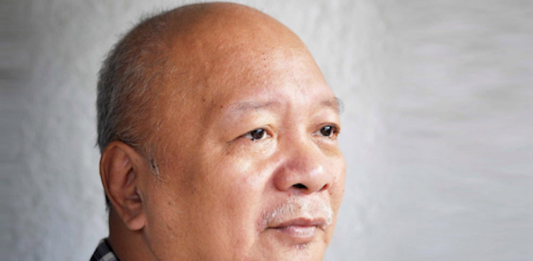 Veteran Filipino investigative journalist Philip Lustre
